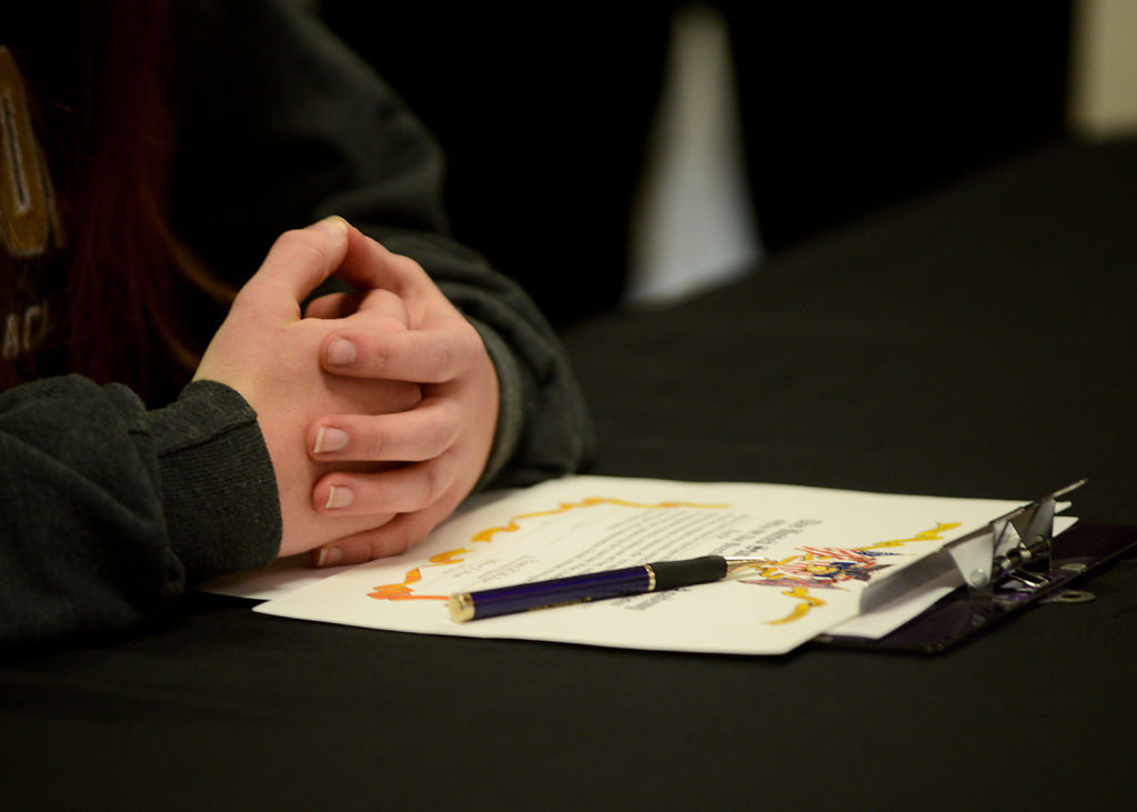 Hickman senior Karly Parcell waits to sign for West Point Military Academy during the first signing day for Hickman athletes